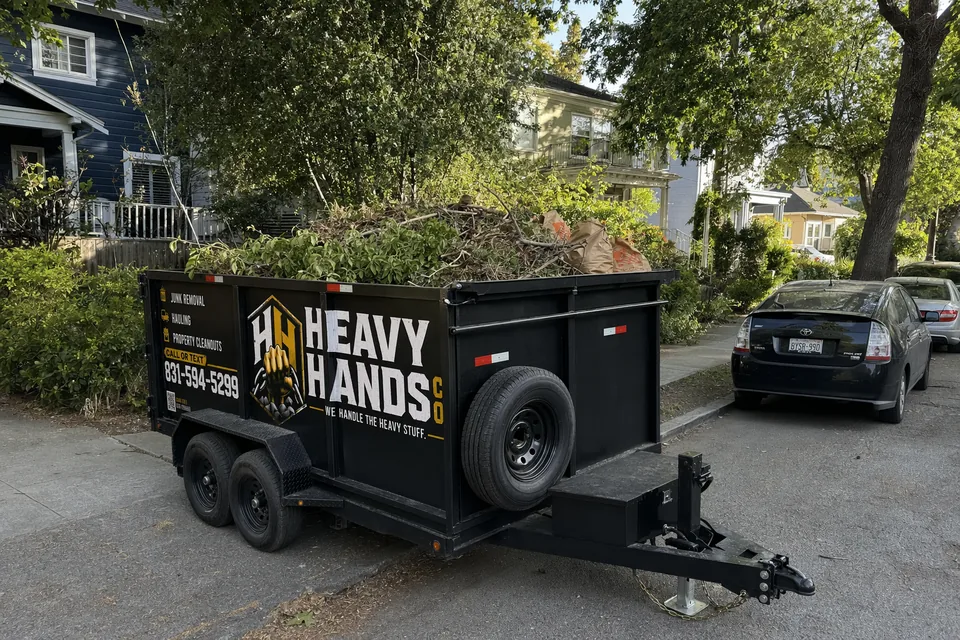 Heavy Hands Co. dump trailer loaded for Yard & Green Waste Removal in San Jose, California
